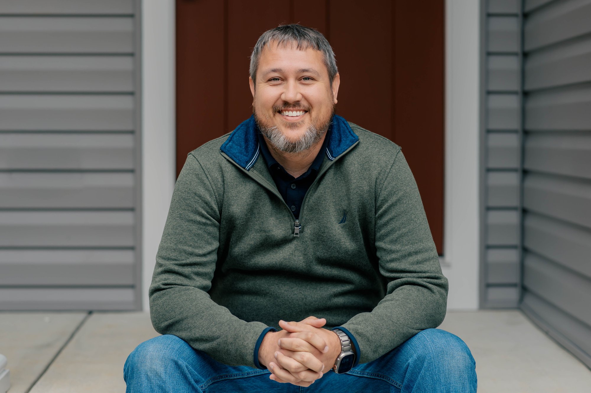 armed_watches_andrew_grooms